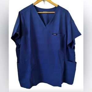 Januu blue S/S v nk scrub top w 2 Frnt Pckts & 2 bk vnts WM 2X utility medical